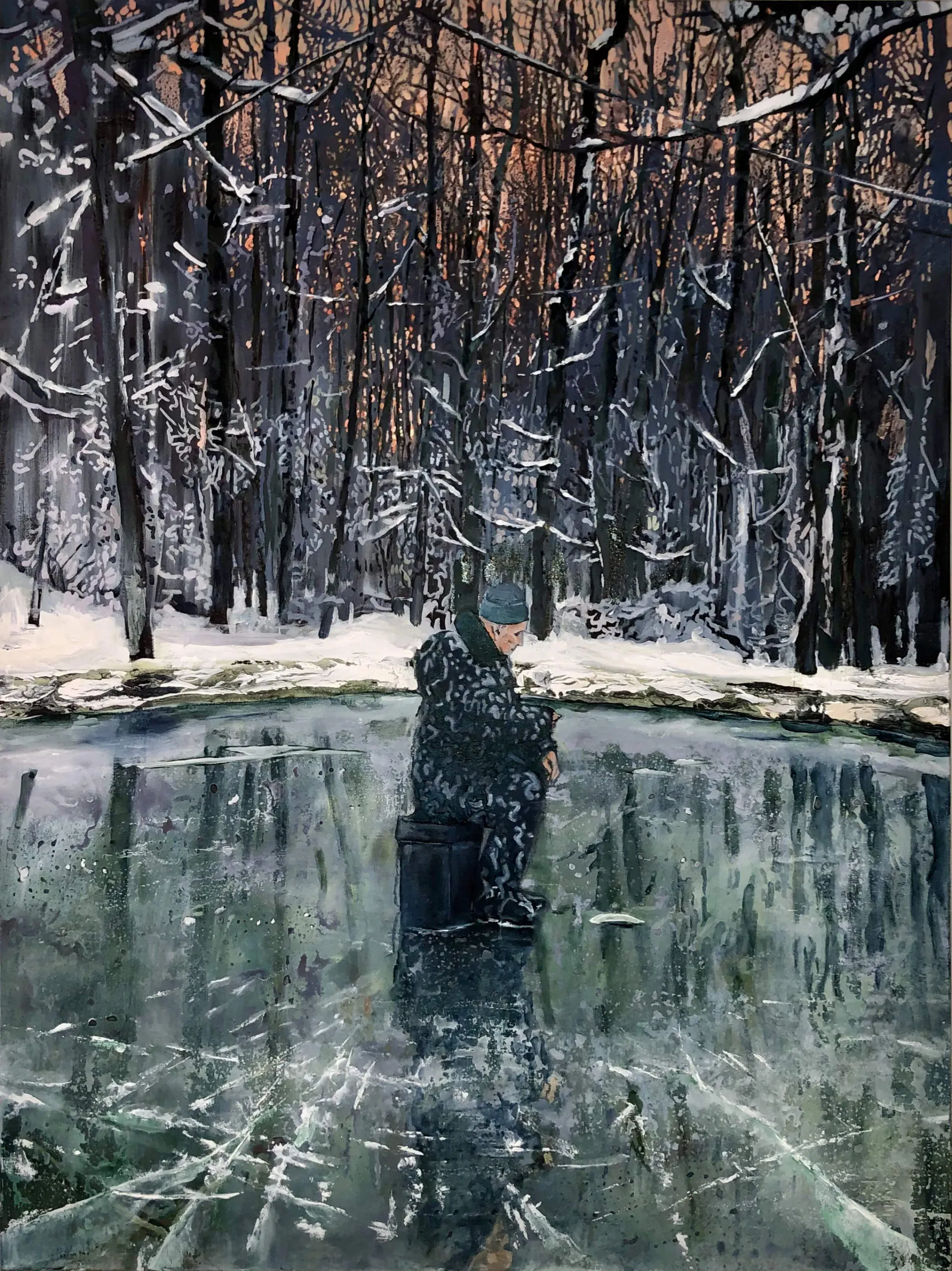A man sits alone in the middle of a frozen lake.