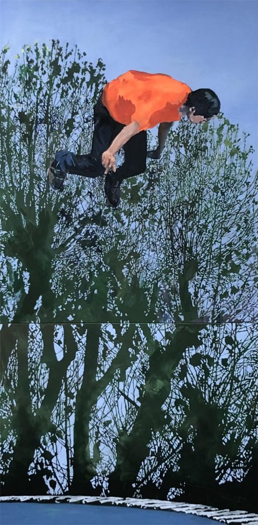 A skateboarder in mid-air.