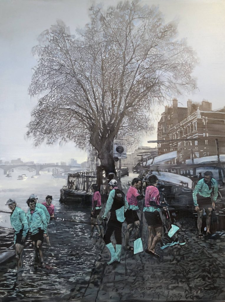 Rowers at the water's edge on an overcast winter's day.